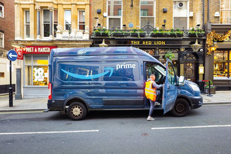 Amazon Prime deliver van parked on road