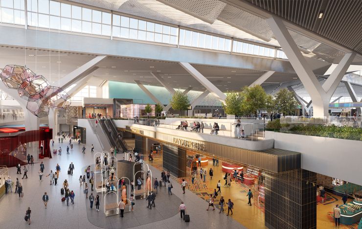 Modern concessions area bustling with travelers at The New Terminal One, JFK.